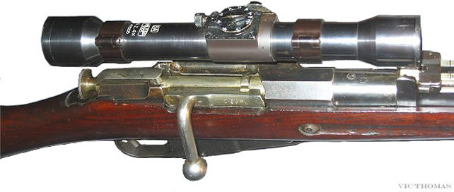 M28/30 狙 击 步 枪.由 于 瞄 准 镜 的 影 响.芬 兰 人 改 用 了 一 种 弯 曲 的 装 填 桥 夹.