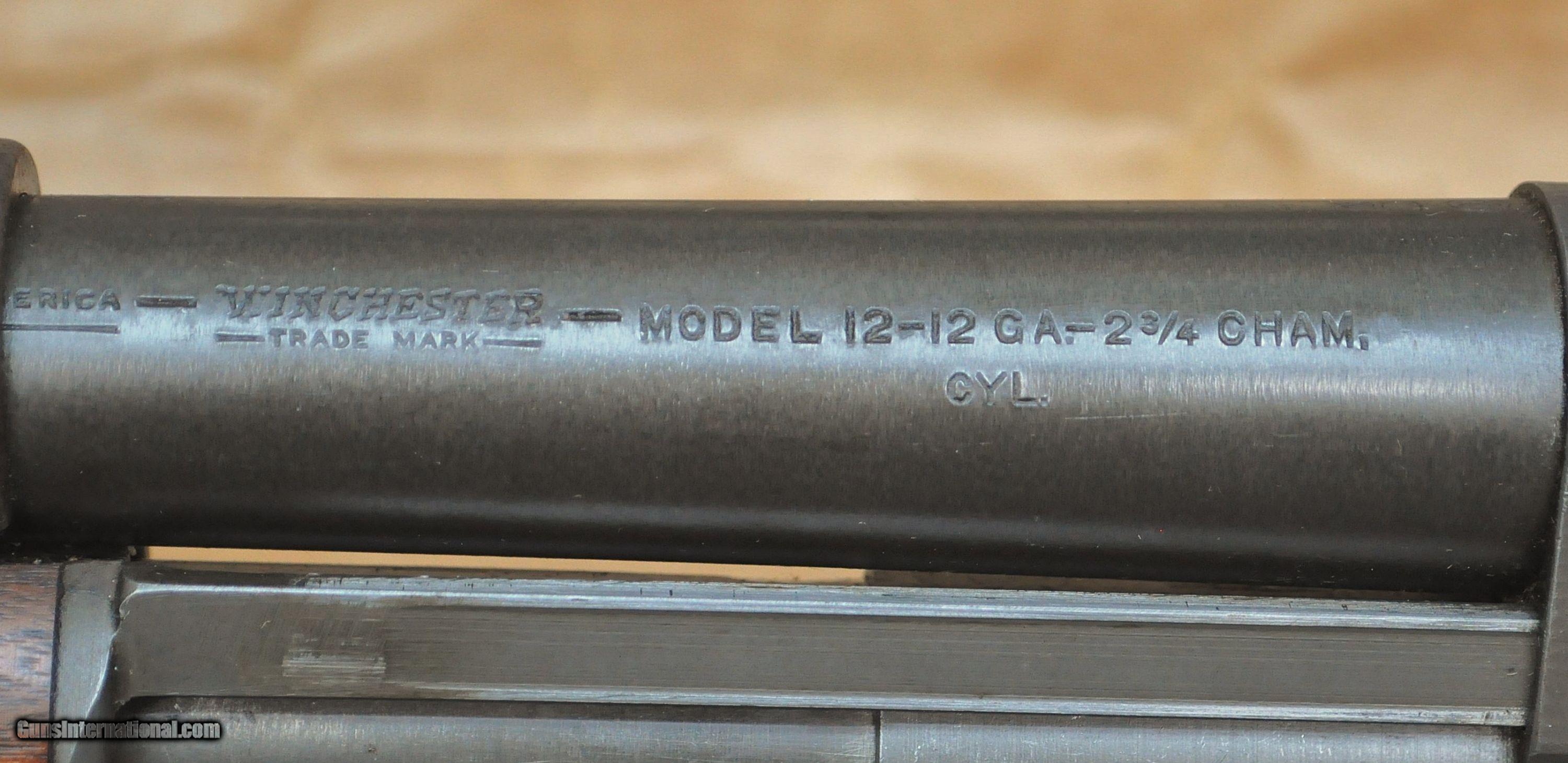 按 美 军 合 同 生 产 的 温 彻 斯 特 12 型 的 机 匣 上 有"U.S."字 样 和 小 炸 弹 图 案... 